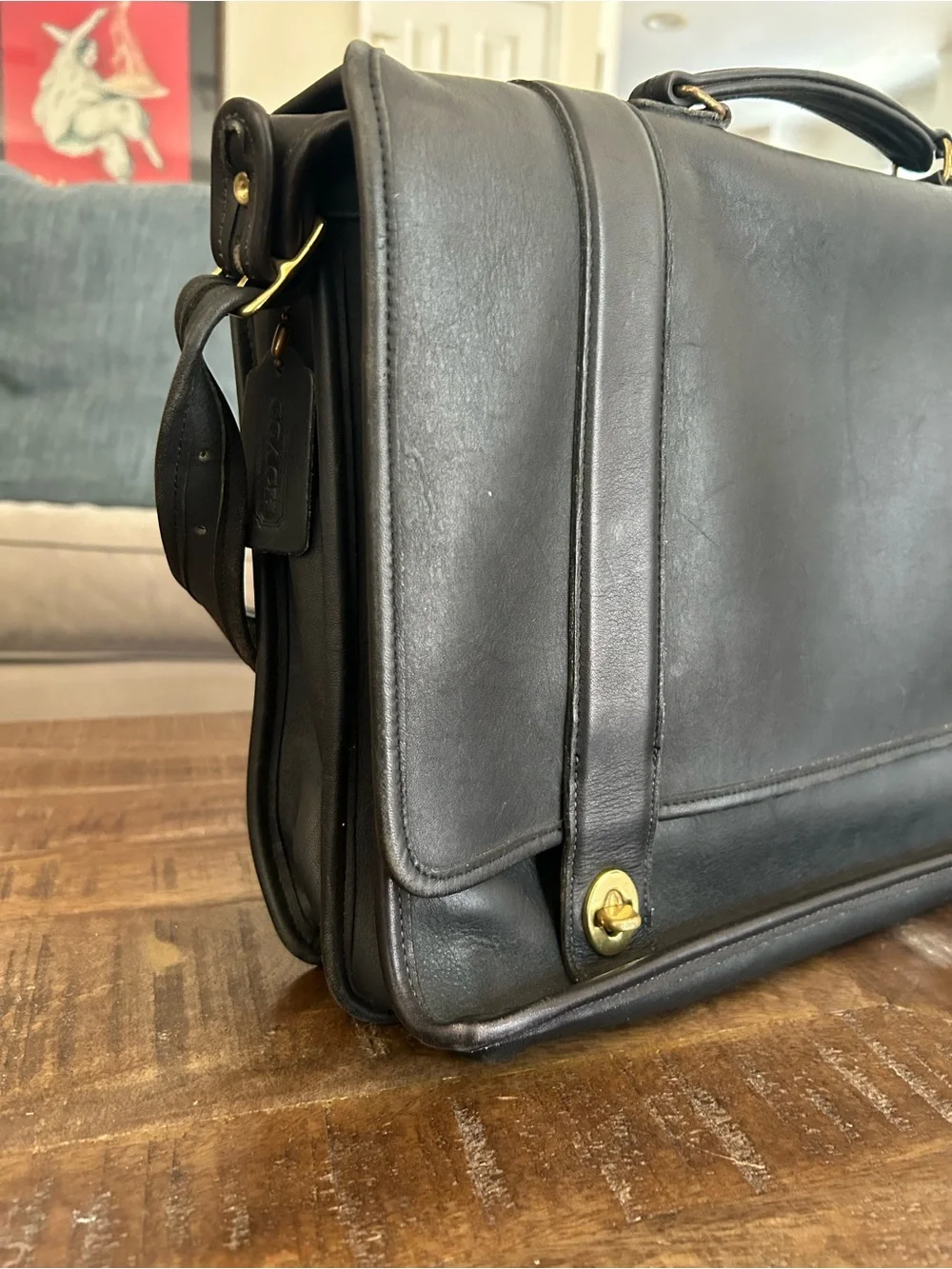 Coach Black Leather Messenger Bag with Gold Hardware